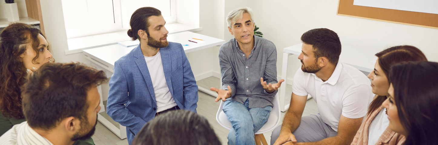 Group of people in leadership coaching session