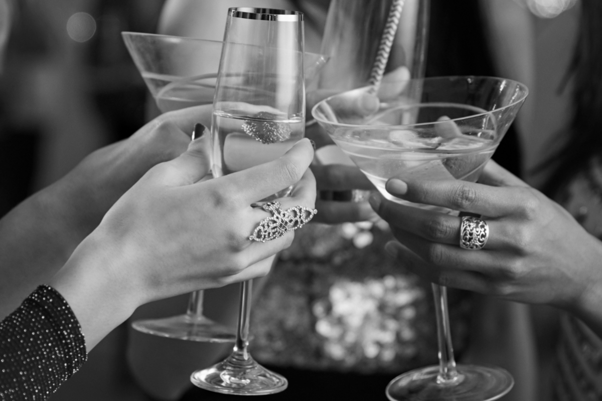 People cheering with drinks 