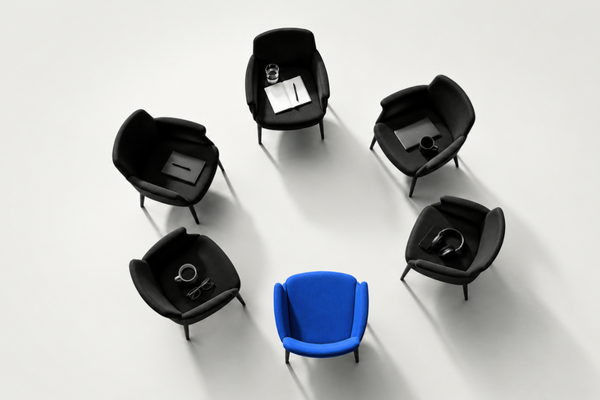 6 chair in a circle with people items they left on them
