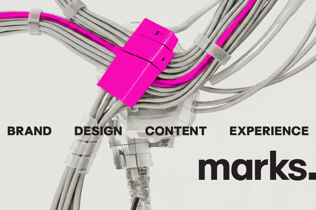 Abstract grey cables flow around a bright pink connector, with the words “Brand, Design, Content, Experience” and the MARKS logo.