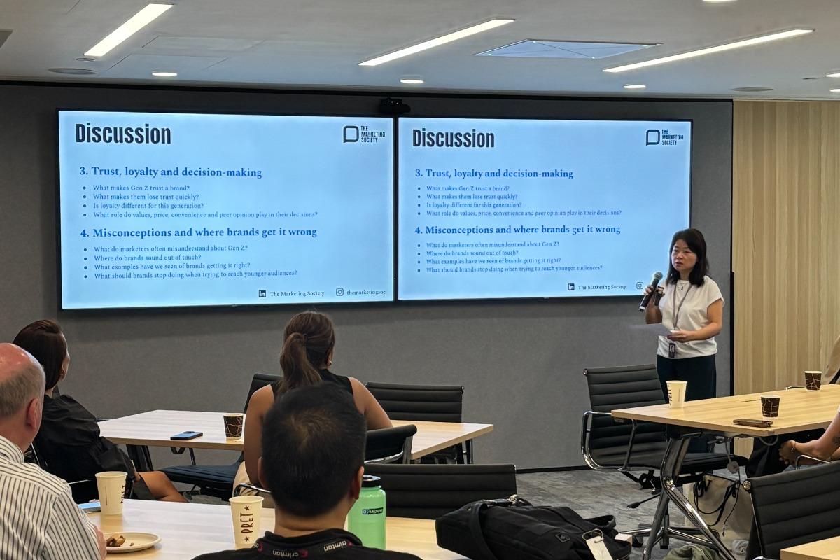 Speaker Megan Ho addressing the members at the Coffee & Conversation: Understanding and Reaching Gen Z intimate session